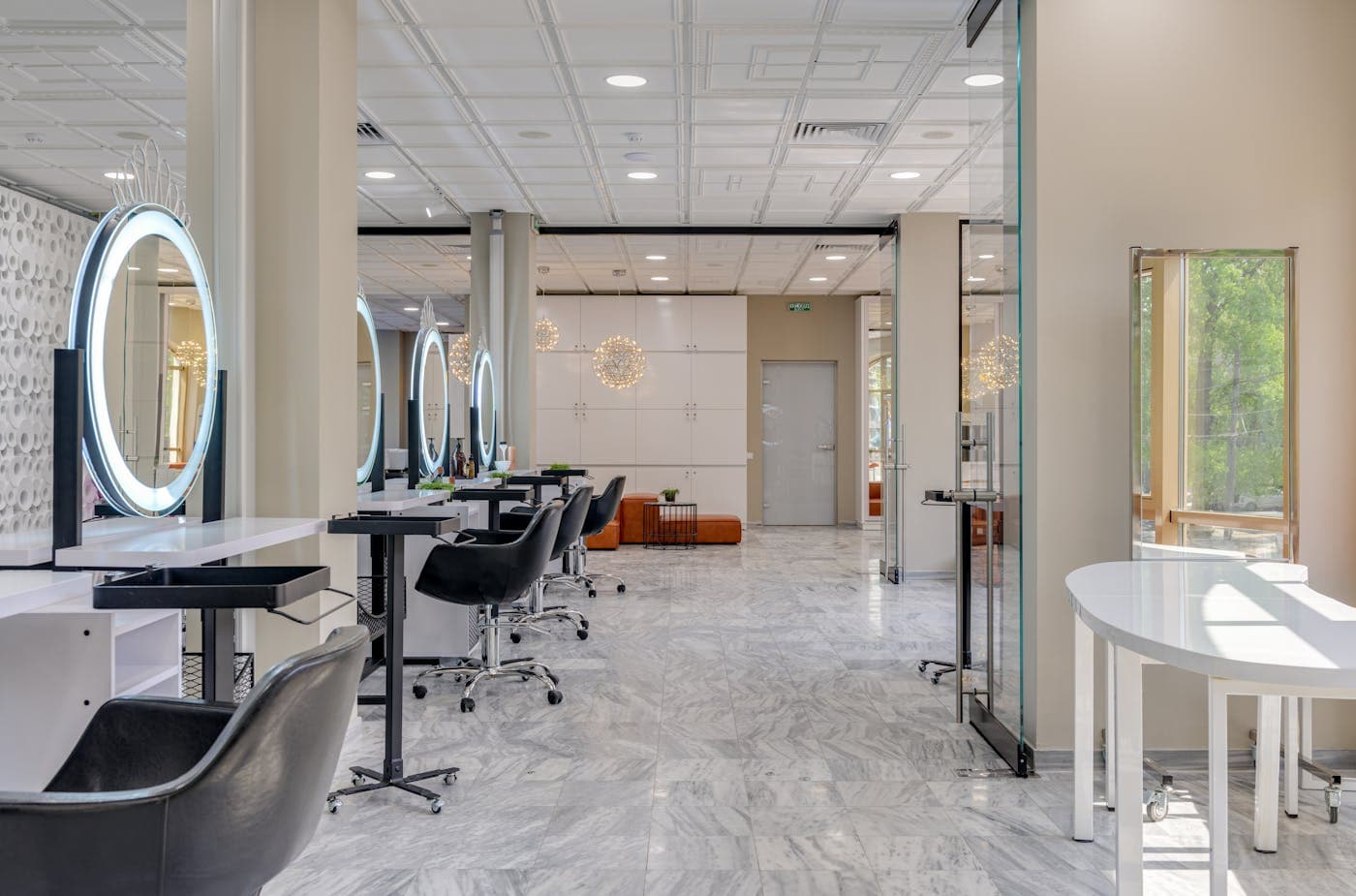 Bright salon interior with styling stations and mirrors